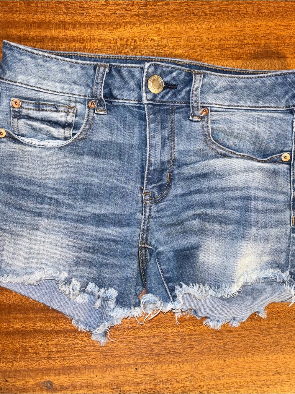 AE Distressed Light Blue Denim Shorts